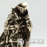 GUARDIA CIVIL CON CAPA,  TERMINACION EN BRONCE.