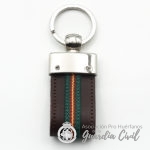 LLAVERO PIEL MARRON, ELESTICO VERDE CON LOGO GC - Imagen 2